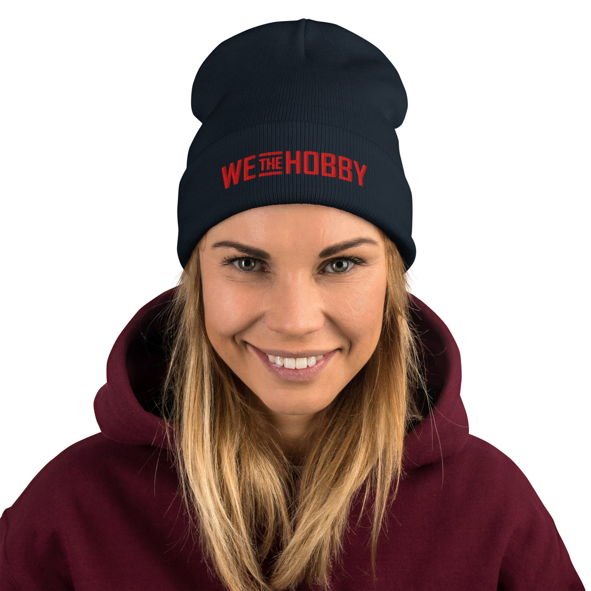 Product mockup - black knit beanie with red WeTheHobby text